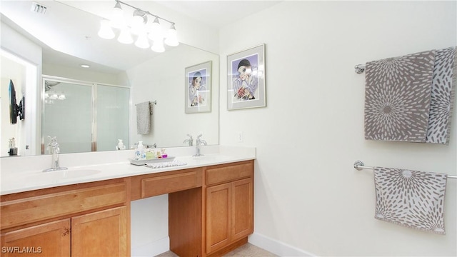 full bath featuring a stall shower, visible vents, a sink, and double vanity