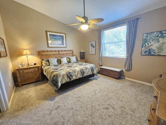 carpeted bedroom featuring lofted ceiling and ceiling fan