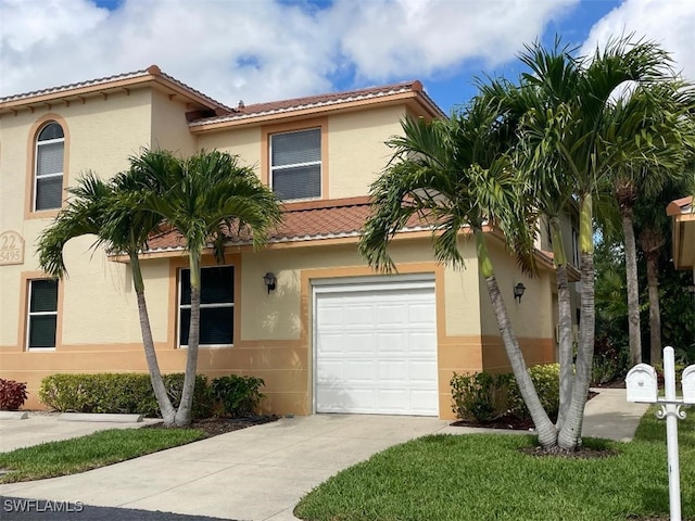 15495 Bellamar Cir Unit 2222, Fort Myers, FL 33908 - mediterranean / spanish home with a tile roof, driveway, stucco siding, and a garage