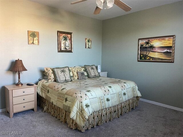 15495 Bellamar Cir Unit 2222, Fort Myers, FL 33908 - bedroom with carpet floors, baseboards, and a ceiling fan