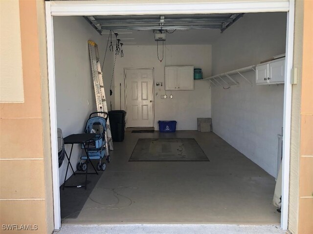 15495 Bellamar Cir Unit 2222, Fort Myers, FL 33908 - garage with a garage door opener