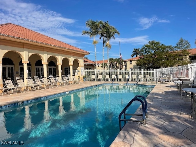 15495 Bellamar Cir Unit 2222, Fort Myers, FL 33908 - community pool featuring a patio area