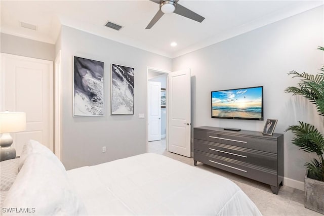 tiled bedroom with crown molding and ceiling fan