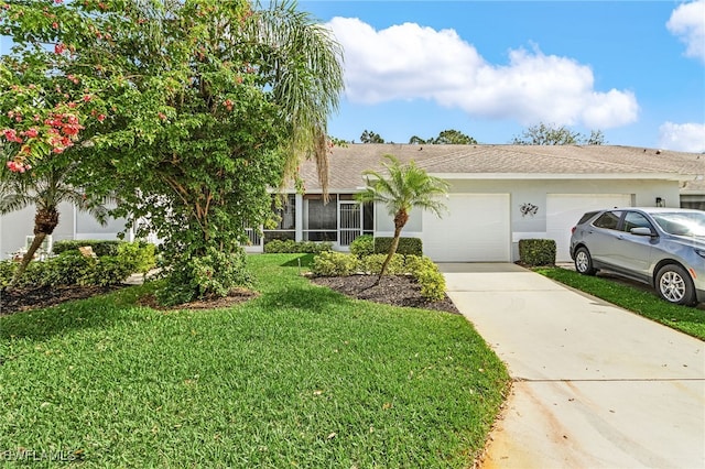 20681 Country Barn Dr, Estero, FL 33928 - view of front of property featuring stucco siding, driveway, a front yard, and a garage
