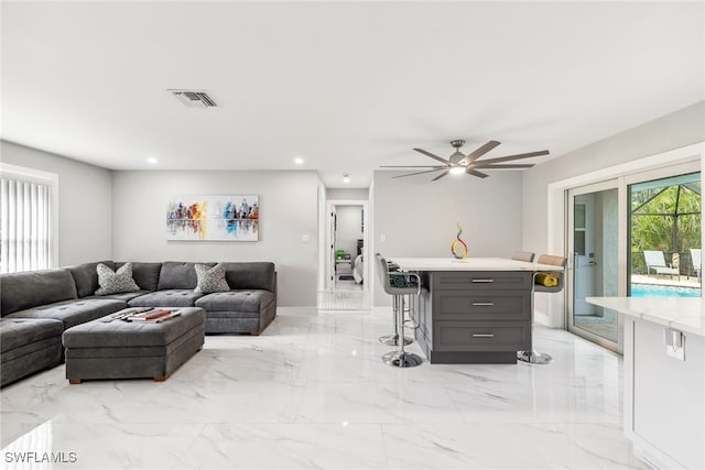 living room with ceiling fan