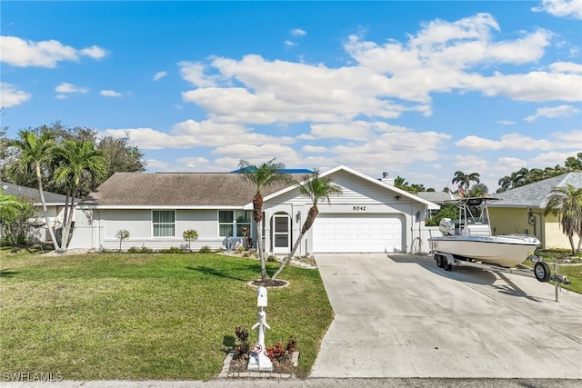 single story home with a garage and a front yard