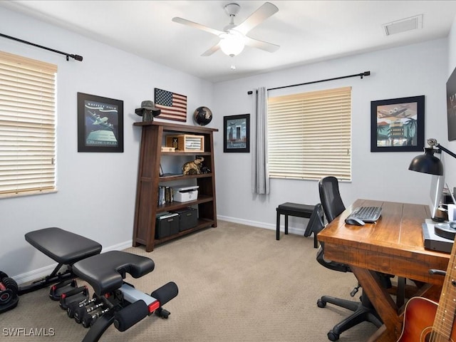 office featuring light colored carpet and ceiling fan