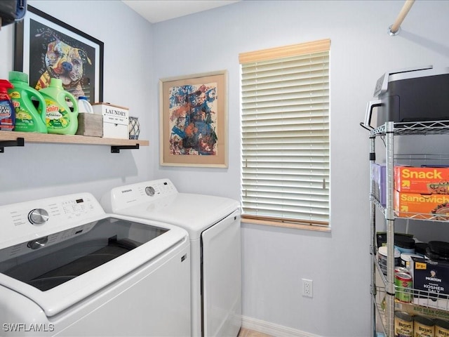 laundry area with separate washer and dryer