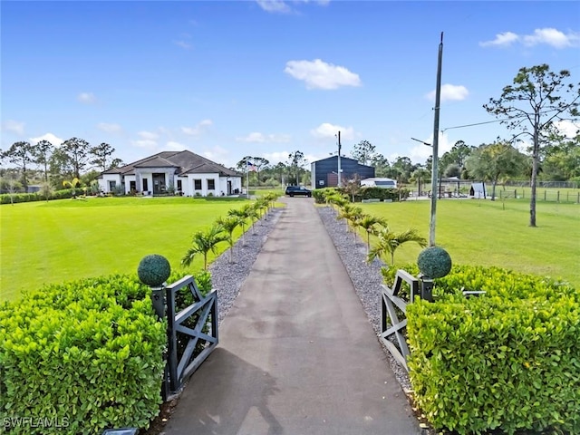 view of community featuring a lawn