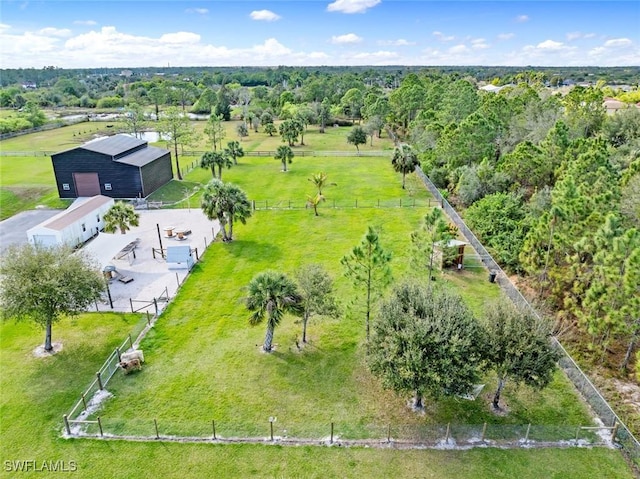 birds eye view of property featuring a rural view