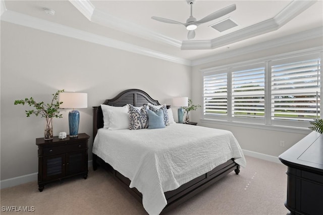 bedroom featuring ceiling fan, ornamental molding, a raised ceiling, and light carpet