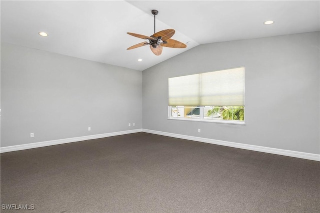 spare room with a ceiling fan, recessed lighting, vaulted ceiling, and baseboards