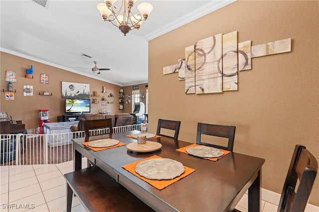 dining space featuring light tile patterned floors, ornamental molding, vaulted ceiling, and ceiling fan with notable chandelier