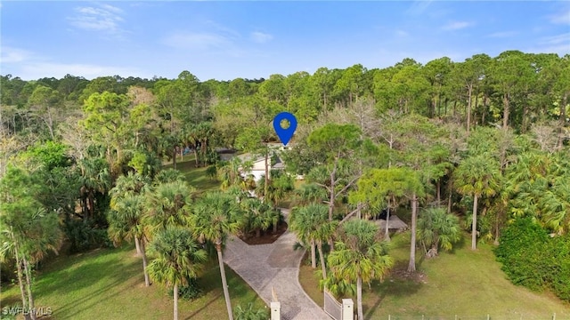 aerial view featuring a view of trees