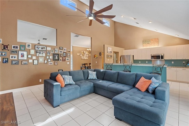 living room featuring high vaulted ceiling, a ceiling fan, and light tile patterned flooring