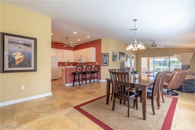 dining area with ceiling fan with notable chandelier