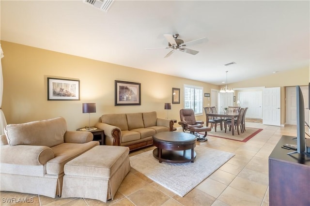 living room with light tile patterned floors, vaulted ceiling, and ceiling fan