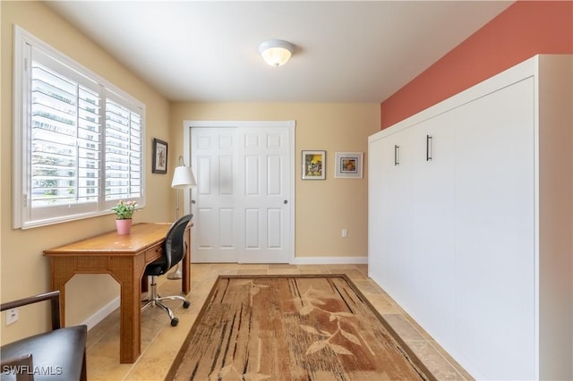 office area with light tile patterned floors