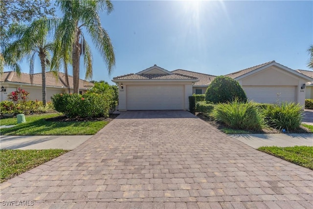 view of front of property featuring a garage