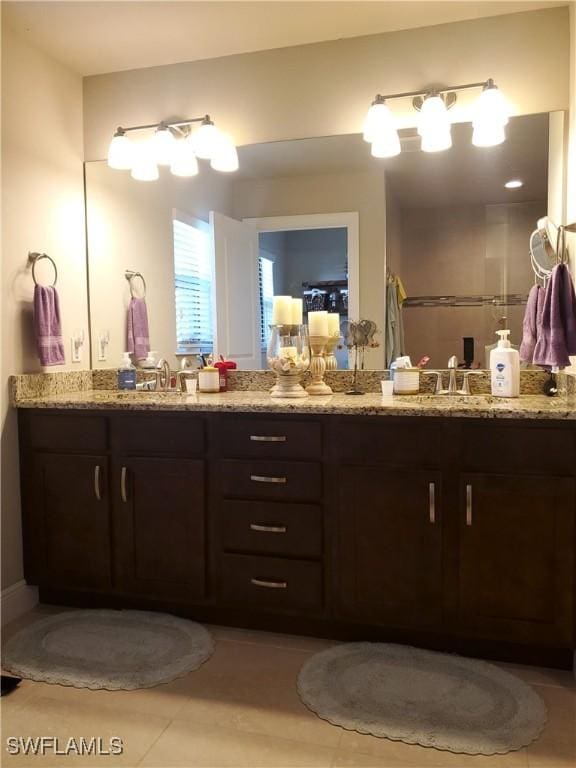 bathroom with vanity and tile patterned floors