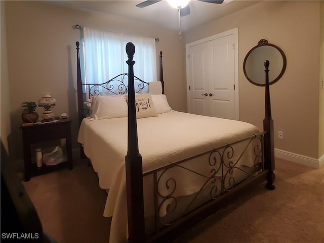 bedroom with ceiling fan and carpet