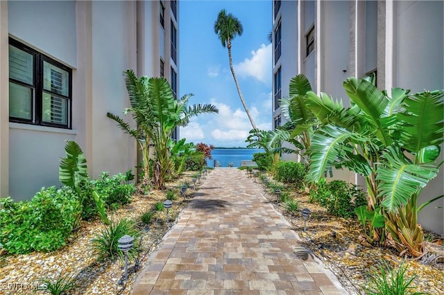 view of home's community with a water view