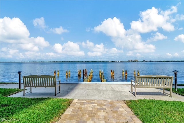 dock area with a water view