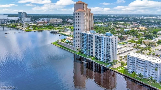 aerial view featuring a water view and a city view