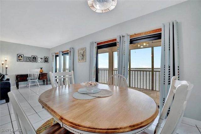 dining room featuring light tile patterned flooring