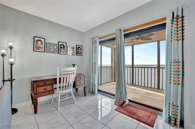 home office with tile patterned flooring and baseboards