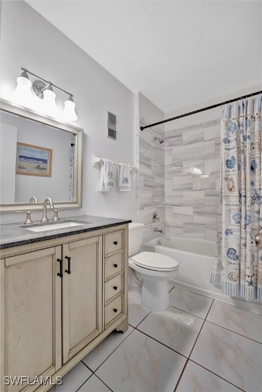 full bath with shower / tub combo, visible vents, vanity, and toilet