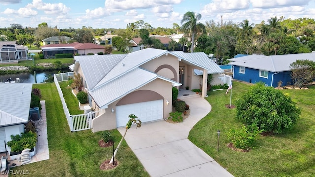 drone / aerial view featuring a water view