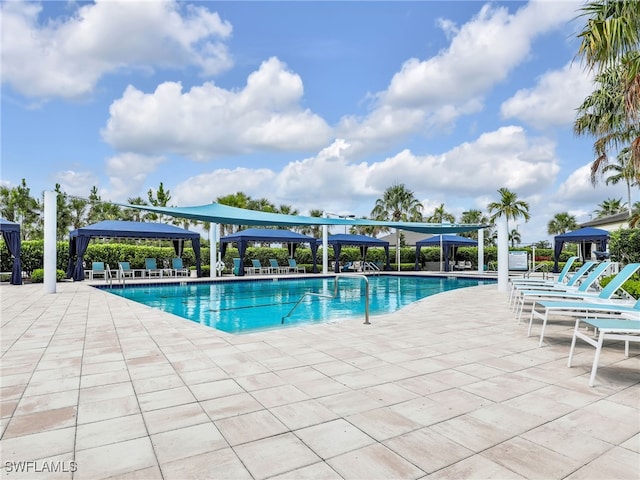 view of pool with a gazebo and a patio