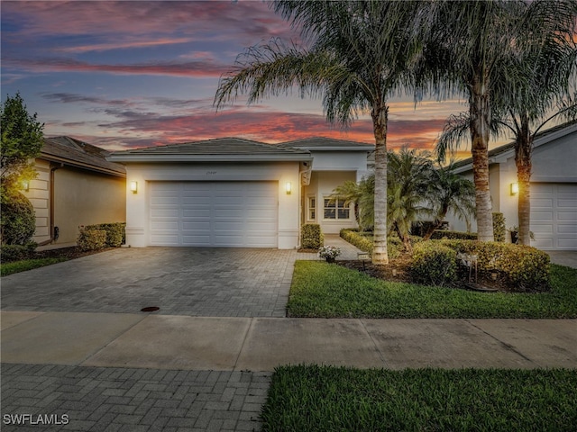 view of front of property with a garage