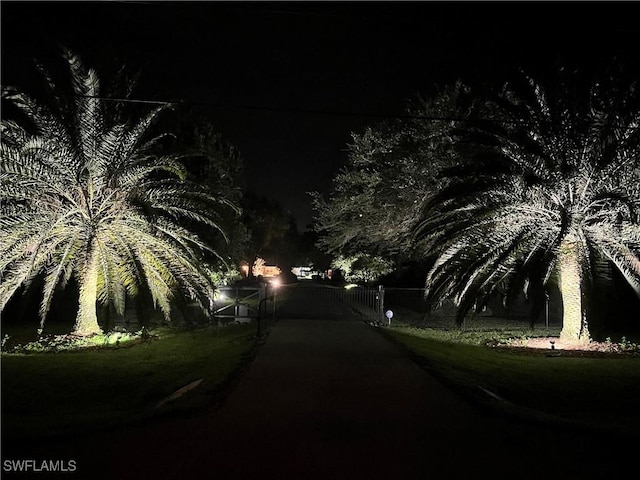 view of road featuring a gate