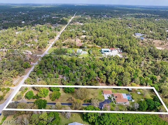 drone / aerial view with a forest view