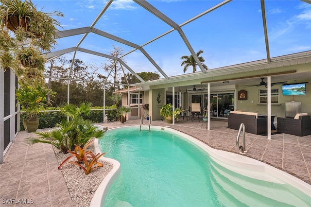 outdoor pool featuring a ceiling fan, an outdoor living space, a patio area, and a lanai