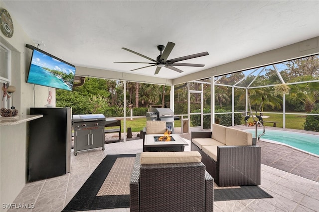 view of patio with an outdoor living space with a fire pit, a lanai, an outdoor pool, and a grill