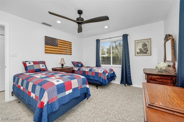 carpeted bedroom with visible vents, recessed lighting, a ceiling fan, and baseboards