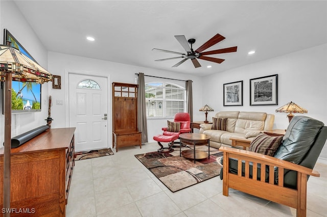 living room with a ceiling fan, recessed lighting, and a wealth of natural light