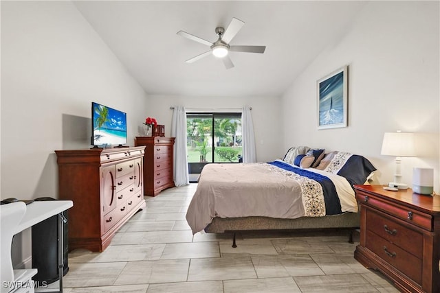 bedroom featuring ceiling fan, vaulted ceiling, and access to outside