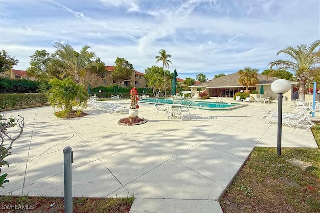 exterior space featuring a patio and a swimming pool