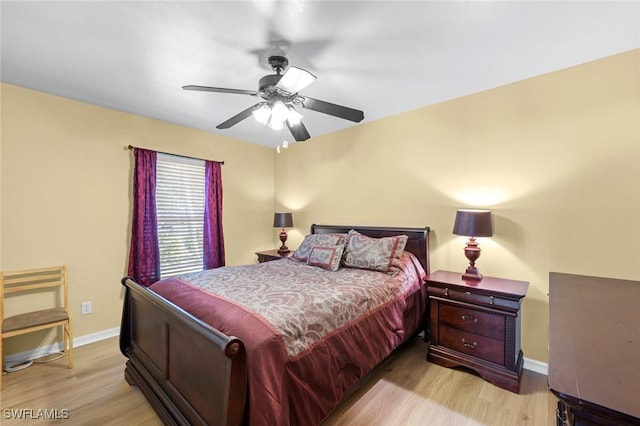 bedroom featuring ceiling fan and light wood-type flooring