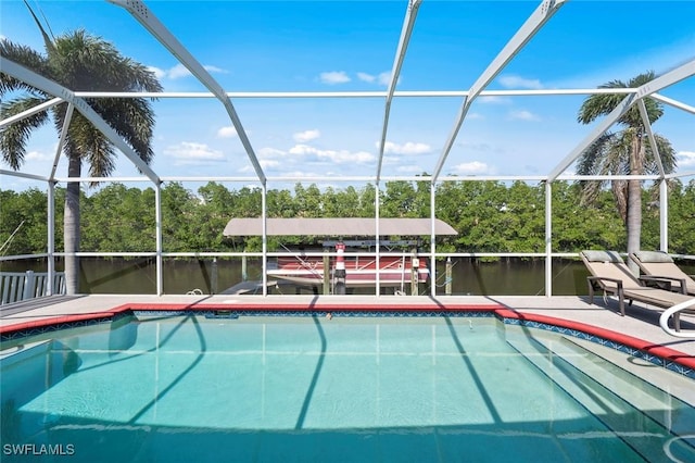 view of swimming pool featuring a water view and glass enclosure