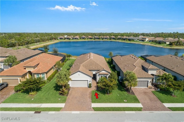 drone / aerial view featuring a water view