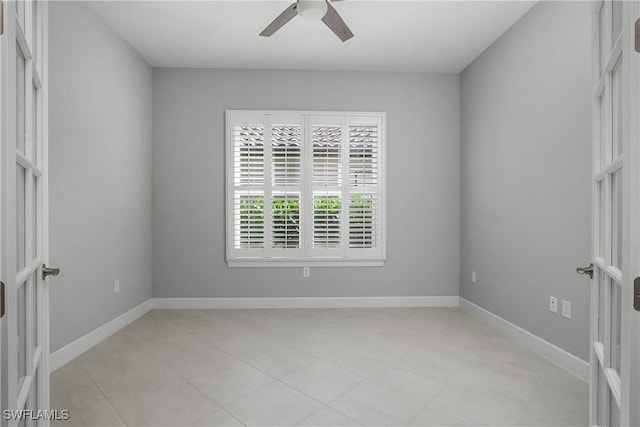 empty room featuring ceiling fan