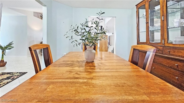 view of tiled dining space