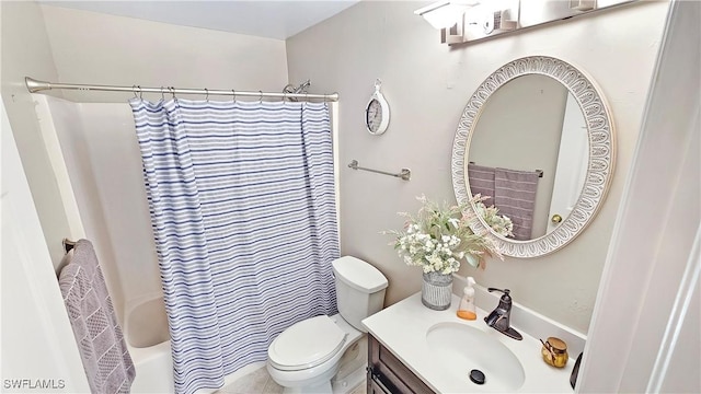 full bathroom featuring shower / bath combination with curtain, vanity, and toilet