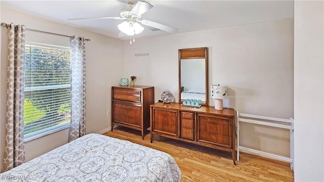 bedroom with light hardwood / wood-style floors