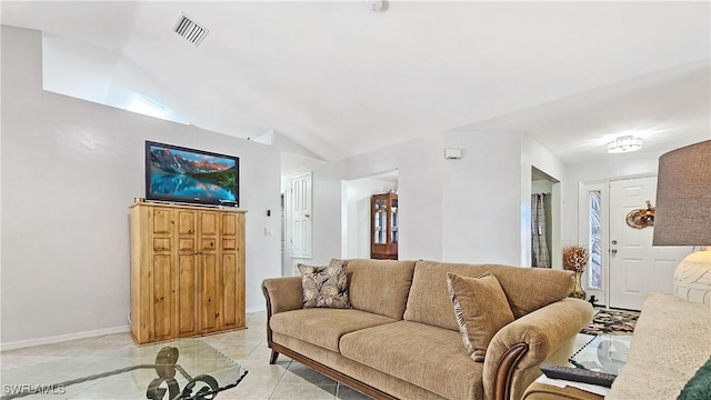 tiled living room featuring lofted ceiling